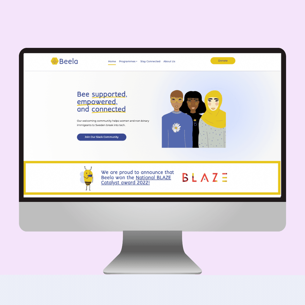 A mockup image of Beela's website on an iMac.